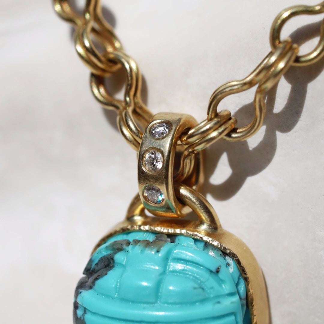 Turquoise scarab pendant discount